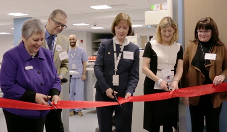 Vivian Eliopoulos, Michele Babich and Mary Ackenhusen cut the ribbon to officially open the Vancouver Pharmacy Production Centre, with assistance from Cathy Figura
